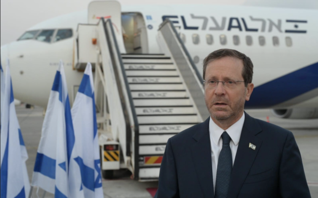 President Isaac Herzog departs for a state visit to Germany, September 4, 2022. (Amos Ben-Gershom/GPO)