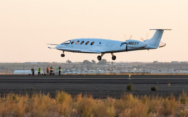 Alice, an all-electric airplane designed and built by Eviation, takes off in Moses Lake, Washington, for its first flight, September 27, 2022. (Ellen M. Banner/The Seattle Times via AP)