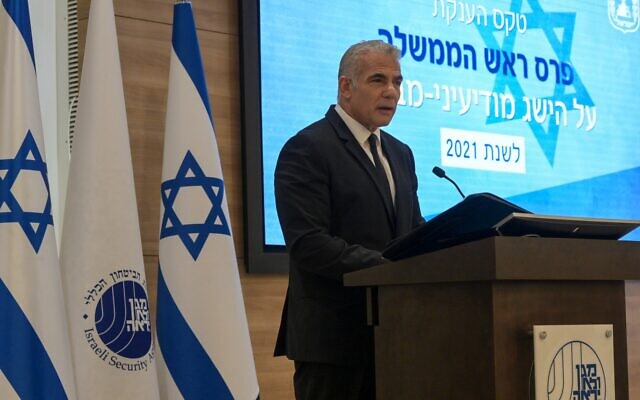 Prime Minister Yair Lapid speaks at a event recognizing Shin Bet operations, at Shin Bet headquarters in Tel Aviv on September 8, 2022. (Kobi Gideon/GPO)