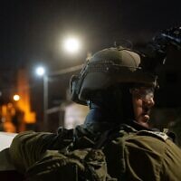 An Israeli officer is seen during an arrest operation in the West Bank, September 22, 2022. (Israel Defense Forces)