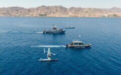 Israeli Navy vessels sail alongside US naval drones in the Gulf of Aqaba, in an image published by the military on September 22, 2022. (Israel Defense Forces)
