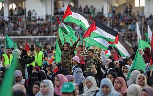 Supporters of the Palestinian Hamas terror group attend a rally in support of Jerusalem's Al-Aqsa Mosque in Gaza City on October 1, 2022. (Mahmud HAMS/AFP)