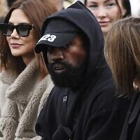 US rapper Kanye West, attends the Givenchy Spring-Summer 2023 fashion show during the Paris Womenswear Fashion Week, in Paris, on October 2, 2022. (Julien De Rosa/AFP)