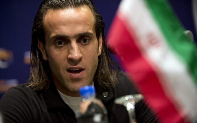 Iranian soccer star Mohammad Ali Karimi, then a nominee of AFC Player Of The Year, speaks at a press conference in the Malasian capital Kuala Lumpur, November 28, 2012. (Saeed KHAN / AFP)
