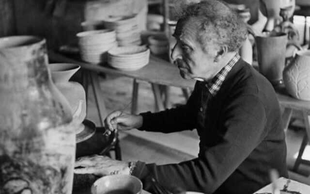 This file photo dated June 11, 1952 shows Russian-born French painter Marc Chagall working in the Madoura studio in Vallauris. (MEUNIER / AFP)