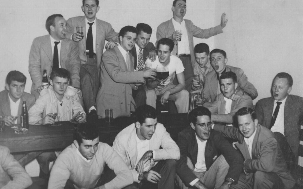 Paul Newman (in white t-shirt) with fraternity brothers at Kenyon College in the late 1940s. (Newman Family Collection)