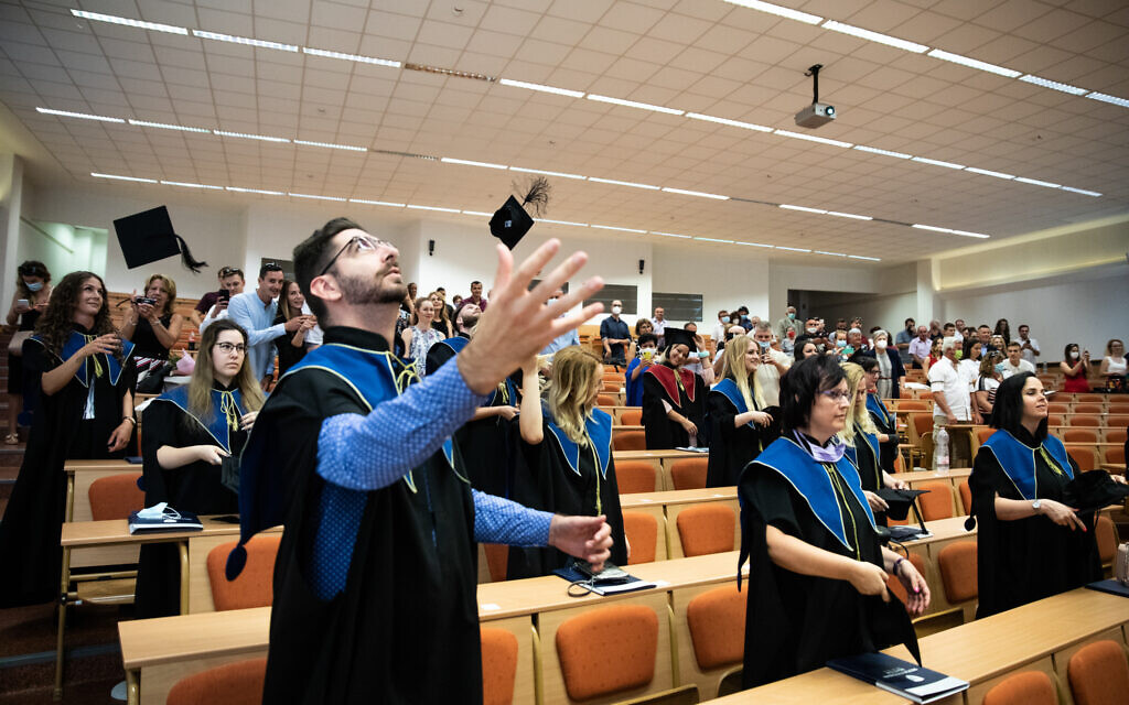 Students and faculty attend a graduation ceremony at Milton Friedman University in Budapest, Hungary, July 21, 2021. (Courtesy of Milton Friedman University/ via JTA)