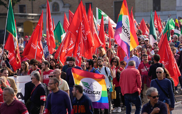 People gather during a march organized by the anti-fascist Italian Partisans association in Mussolini's birthplace Predappio, Italy, Oct. 28, 2022. (AP Photo/Luca Bruno)