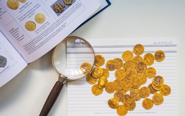 A hoard of gold coins found concealed in a wall at the Bania archeological site. (Dafna Gazit/Israel Antiquities Authority)