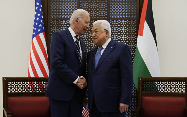 Palestinian President Mahmoud Abbas and US President Joe Biden shake hands in the West Bank town of Bethlehem, July 15, 2022. (AP Photo/Evan Vucci)