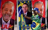 A demonstrator dressed in the colors of the Brazilian flag performs in front of a street vendor's towels for sale featuring Brazilian presidential candidates, current President Jair Bolsonaro, center, and former President Luiz Inacio Lula da Silva, in Brasilia, Brazil, September 27, 2022. (Eraldo Peres/AP)