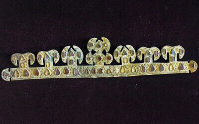 The 1,500 year-old golden tiara, inlaid with precious stones, one of the world's most valuable artifacts from the blood-letting rule of Attila the Hun, is seen in a museum in Melitopol, Ukraine, in November 2020. (AP Photo)