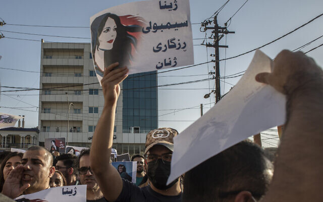 Protesters gather in Sulaimaniyah on September 28, 2022, protest the killing of Mahsa Amini, an Iranian Kurdish woman after she was arrested in Tehran by morality police for wearing her headscarf improperly. (AP Photo/Hawre Khalid, Metrography, File)