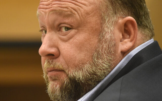 Infowars founder Alex Jones appears in court to testify during the Sandy Hook defamation damages trial at Connecticut Superior Court in Waterbury, Conn., September 22, 2022. (Tyler Sizemore/Hearst Connecticut Media via AP, Pool, File)