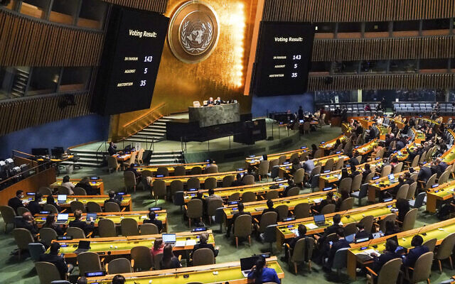 Video monitors show the result of a United Nations General Assembly special emergency session vote in favor of a resolution condemning Russia's illegal referendum in Ukraine, Wednesday Oct. 12, 2022 at UN headquarters. (AP/Bebeto Matthews)