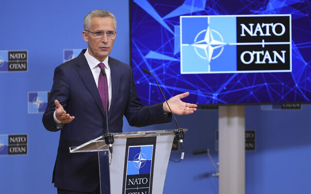 NATO Secretary General Jens Stoltenberg speaks during a media conference after a meeting of NATO defense ministers at NATO headquarters in Brussels, Thursday, Oct. 13, 2022.  (AP Photo/Olivier Matthys)