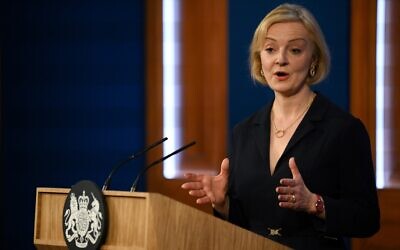 Britain's Prime Minister Liz Truss attends a press conference in the Downing Street Briefing Room in central London, October 14, 2022, following the sacking of the finance minister in response to a budget that sparked markets chaos. (Daniel Leal/Pool Photo via AP)