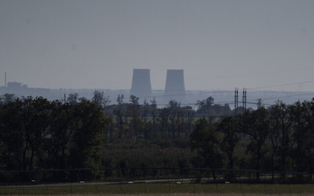 Zaporizhzhia nuclear power plant is seen from around 20 kilometers away in an area in the Dnipropetrovsk region, Ukraine, October 17, 2022. (AP Photo/Leo Correa)