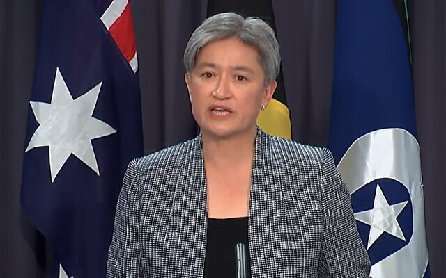 In this image taken from video, Australian Foreign Minister Penny Wong speaks during a press conference, October 18, 2022, in Canberra, Australia. (Australia Pool via AP)