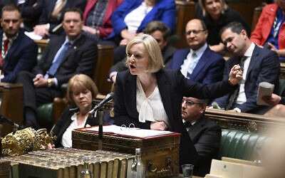 In this handout photo provided by UK Parliament, Britain's Prime Minister Liz Truss speaks during Prime Minister's Questions in the House of Commons in London, October 19, 2022. (Jessica Taylor/UK Parliament via AP)