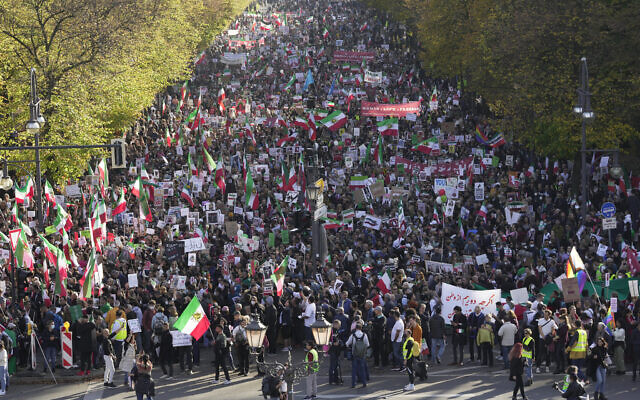People attend a protest against the Iranian regime, in Berlin, Germany, October 22, 2022. (AP Photo/Markus Schreiber)