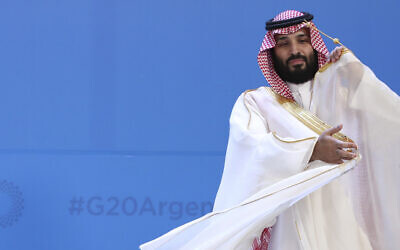 Saudi Arabia's Crown Prince Mohammed bin Salman adjusts his robe as leaders gather for the group at the G20 Leader's Summit at the Costa Salguero Center in Buenos Aires, Argentina, November 30, 2018. (Ricardo Mazalan/AP)