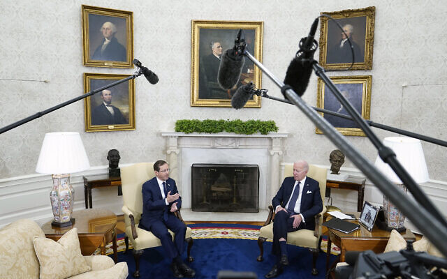 US President Joe Biden and President Isaac Herzog, during a meeting in the Oval Office of the White House, Wednesday, Oct. 26, 2022, in Washington. (AP Photo/Patrick Semansky)
