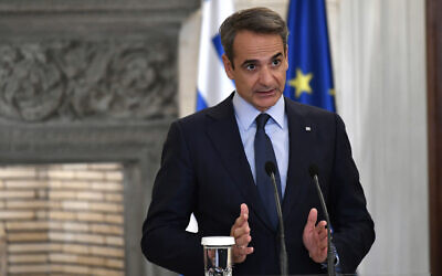 Greek Prime Minister Kyriakos Mitsotakis talks to the media during a press conference after a meeting with German Chancellor Olaf Scholz, at Maximos Mansion in Athens, October 27, 2022. (AP/Michael Varaklas)