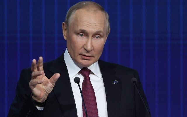 Russian President Vladimir Putin gestures while speaking at the plenary session of the 19th annual meeting of the Valdai International Discussion Club outside Moscow, Russia, Thursday, October 27, 2022. (Sergei Karpukhin, Sputnik, Kremlin Pool Photo via AP)