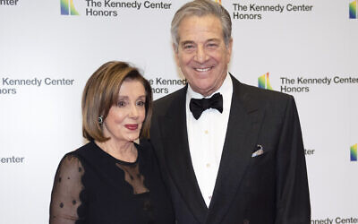 Speaker of the US House Nancy Pelosi, and her husband, Paul Pelosi, arrive at the State Department for the Kennedy Center Honors State Department Dinner, December 7, 2019, in Washington. (AP Photo/Kevin Wolf, File)