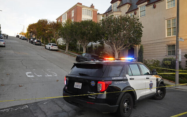A police car blocks the street below the home of House Speaker Nancy Pelosi and her husband Paul Pelosi in San Francisco, October 28, 2022. (AP/Eric Risberg)