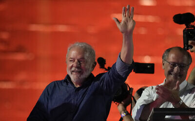 Former Brazilian president Luiz Inacio Lula waves to supporters after he defeated incumbent Jair Bolsonaro in a presidential run-off election to become the country's next president, in Sao Paulo, Brazil, Oct. 30, 2022 (AP Photo/Andre Penner)