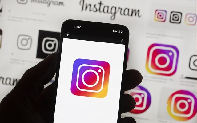 The Instagram logo is seen on a cell phone, Oct. 14, 2022, in Boston.  (AP Photo/Michael Dwyer, file)