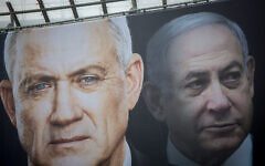 Election posters hung by the Blue and White party show its candidate Benny Gantz and Prime Minister Benjamin Netanyahu with a Hebrew slogan reading 'Netanyahu cares only for himself,' ahead of the 2020 elections.(Miriam Alster/ FLASH90/ File)