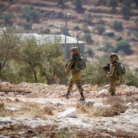 Israeli troops carry out searches following a shooting attack, in the West Bank village of Salem, near Nablus, on October 2, 2022. (Nasser Ishtayeh/Flash90)
