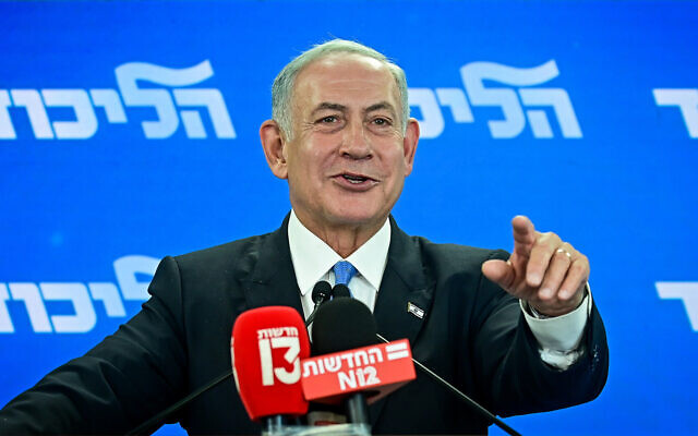 Leader of the opposition and head of the Likud party Benjamin Netanyahu speaks to the media in Tel Aviv on October 3, 2022. (Avshalom Sassoni/Flash90)