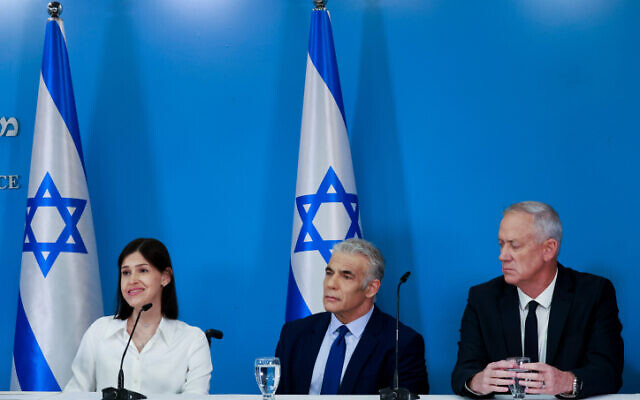Israeli prime minister Yair Lapid, Minister of Defense Benny Gantz and Israeli Minister of Energy Karin Elharar hold a press conference on the maritime border deal with Lebanon, at the Prime Minister's office in Jerusalem, on October 12, 2022. (Olivier Fitoussi/Flash90)
