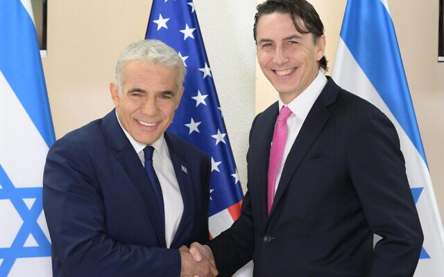 Prime Minister Yair Lapid (L) meets with US mediator Amos Hochstein after the signing of the Israel-Lebanon maritime agreement on October 27, 2022 (Amos Ben Gershom/GPO)