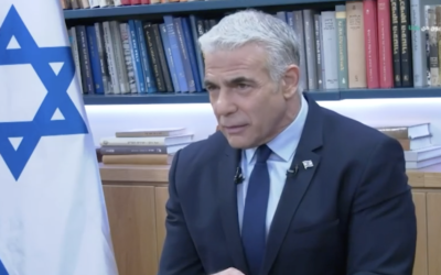Prime Minister Yair Lapid speaks to Arab media outlet Panet, aired October 18, 2022. (Screenshot/Panet: used in accordance with Clause 27a of the Copyright Law)
