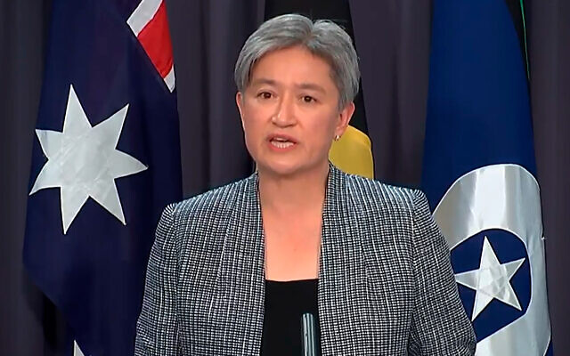 In this image taken from video, Australian Foreign Minister Penny Wong speaks during a press conference, October 18, 2022, in Canberra, Australia. (Australia Pool via AP)