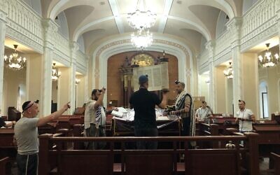 Kyiv residents worship at the Brodsky Synagogue, August 2022. (Lazar Berman/The Times of Israel)