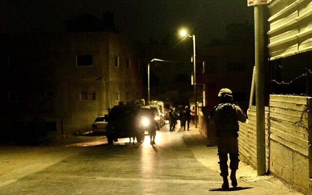Illustrative: Israeli troops conduct searches in the West Bank, October 12, 2022. (Israel Defense Forces)
