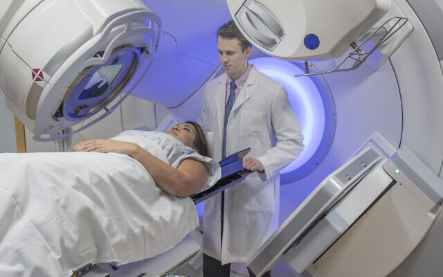 Illustrative image: a woman undergoing radiotherapy (Mark Kostich via iStock by Getty Images)