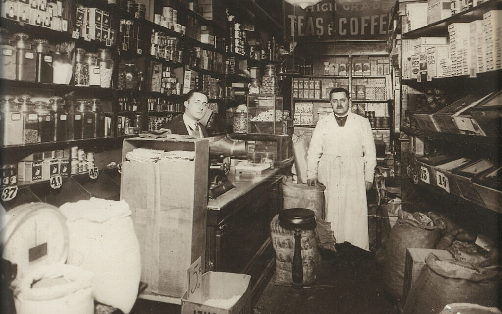 Letty Cottin Pogrebin's uncle Lou Halpern and grandfather Nathan Halpern in the family store, date unknown. (Courtesy)