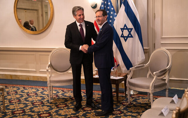 US Secretary of State Anthony Blinken, left, meets with Israel's President Isaac Herzog in Washington, October 25, 2022. (Luke Tress/Times of Israel)