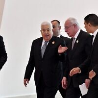 File: Palestinian Authority President Mahmoud Abbas (center), arrives to attend the closing ceremony of Arab summit in the Algerian capital Algiers, on November 2, 2022. (Fethi Belaid / AFP)