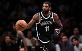 In this photo from  November 1, 2022, Kyrie Irving of the Brooklyn Nets brings the ball up the court during a game against the Chicago Bulls at Barclays Center in New York City. (Dustin Satloff/Getty Images North America/AFP)