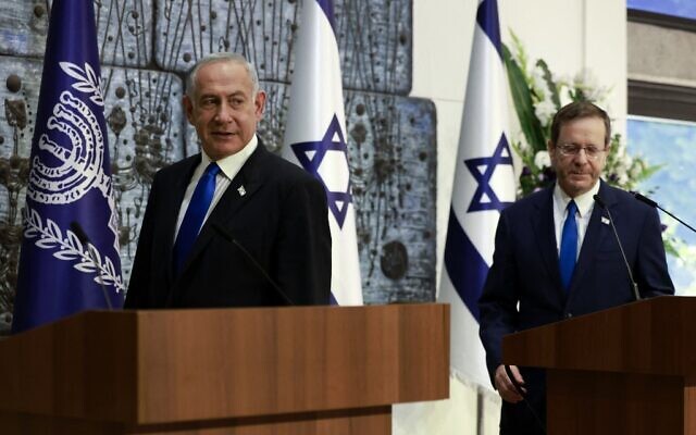 Likud party chairman Benjamin Netanyahu prepares to give a statement after President Isaac Herzog tasks him with forming a new government, at the President's Residence in Jerusalem, on November 13, 2022. (Menahem Kahana / AFP)