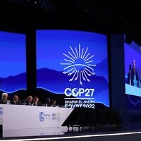 Egypt's Foreign Minister Sameh Shukri, heads the closing session of the COP27 climate conference, at the Sharm el-Sheikh International Convention Centre in Egypt's Red Sea resort city of the same name, on November 20, 2022. (JOSEPH EID / AFP)