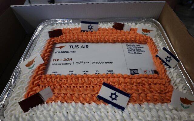A cake prepared by TUS Airways to celebrate the first flight from Tel Aviv to Doha for soccer fans heading to the World Cup 2022 tournament, at Israel's Ben Gourion international airport, on November 20, 2022. (Gil COHEN-MAGEN / AFP)